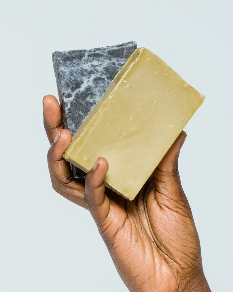 Sade Baron hand holding soaps