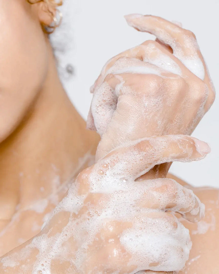 Sade Baron soap lather on woman closeup