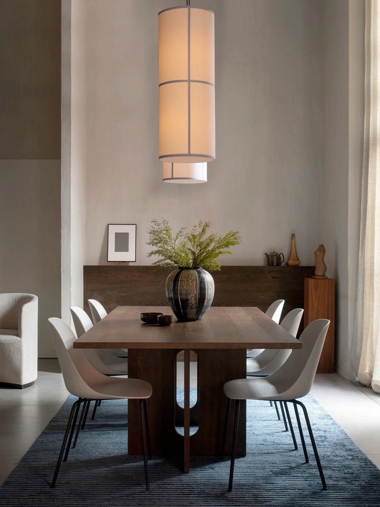 Dining table, chairs, lighting by Audo Copenhagen