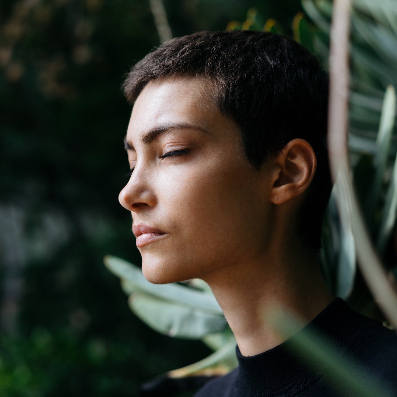 woman breathing outdoors peacefully